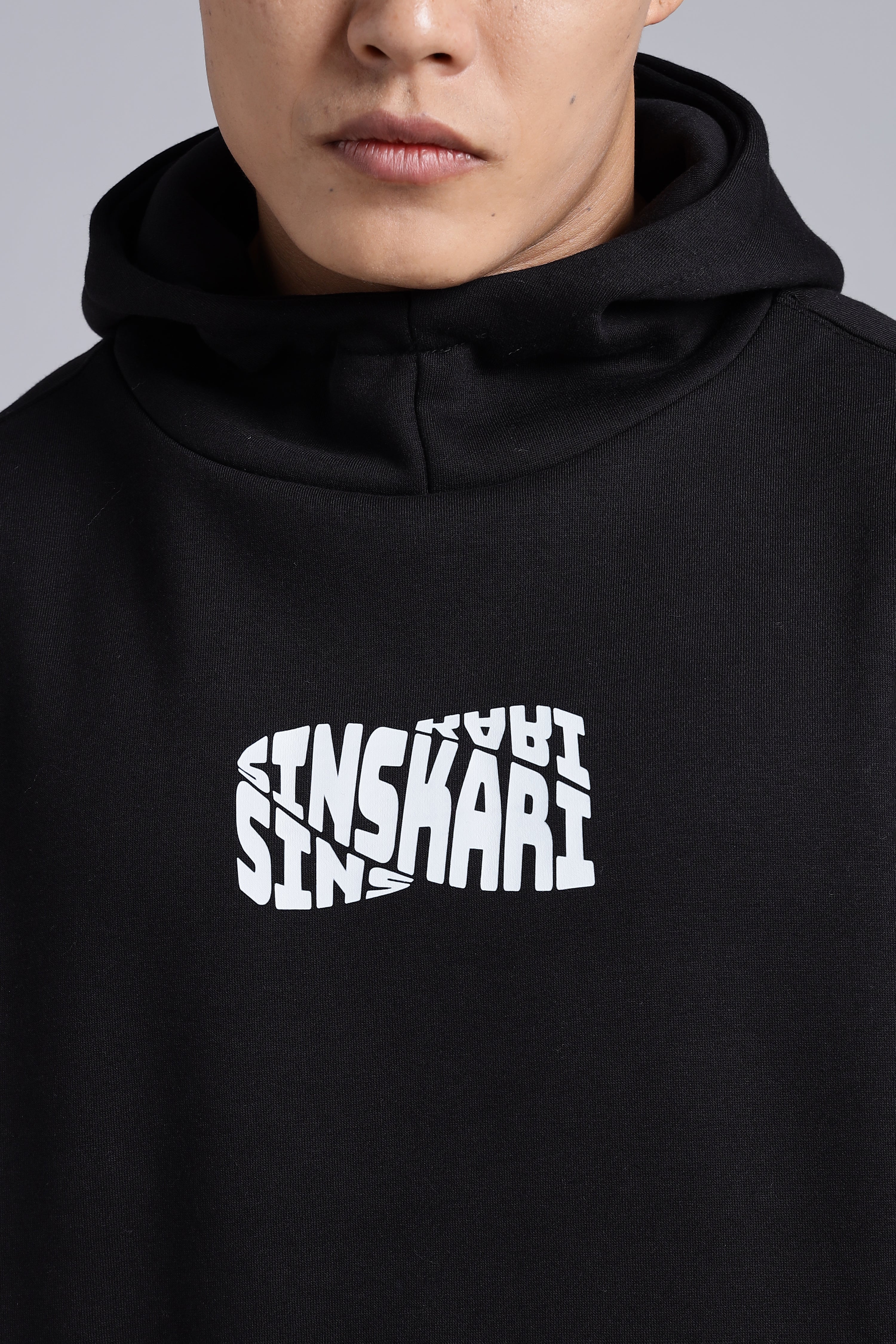 Socially-distracted, Black hood.